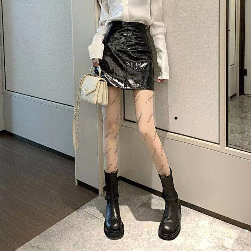 Guangzhou Baihui women's fishing net socks anti-hook silk thin love black silk long one-in-one socks European and American jk pantyhose wholesale
