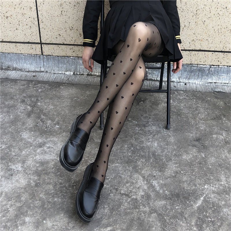 Guangzhou Baihui women's fishing net socks anti-hook silk thin love black silk long one-in-one socks European and American jk pantyhose wholesale