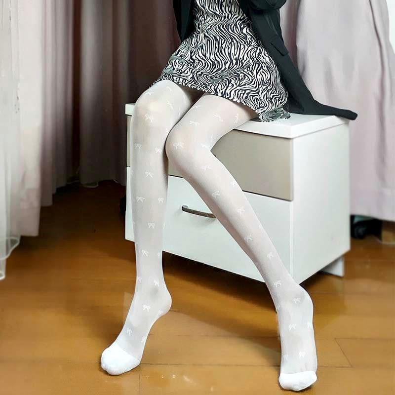 Guangzhou Baihui women's fishing net socks anti-hook silk thin love black silk long one-in-one socks European and American jk pantyhose wholesale